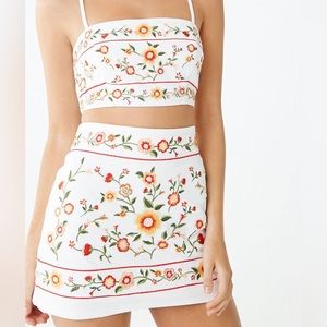 White skirt set with beautiful, colorful floral embroidery